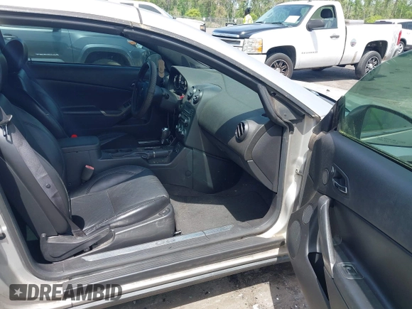 2006 Pontiac G6 GT with VIN 1G2ZH358364273262, listed as a IAAI auction lot 41963147 with 128,440 mi miles and . Bid and sale history available at DreamBid. Image 5.