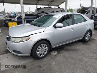 2013 Kia Forte LX with VIN KNAFT4A21D5739585, listed as a IAAI auction lot 42097213 with 195,500 mi miles. Bid and sale history available at carsss.com. Image 2.