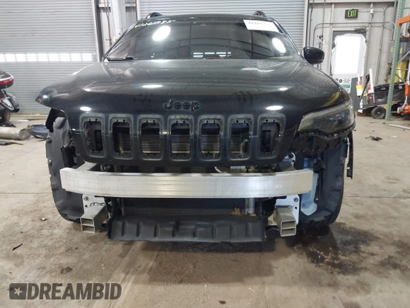 2021 Jeep Cherokee Altitude with VIN 1C4PJLLB7MD189285, listed as a IAAI auction lot 41262735 with 57,061 mi miles. Bid and sale history available at carsss.com. Image 19.