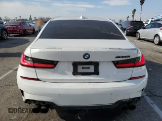 2021 BMW 3 Series M340i xDrive with VIN 3MW5U9J07M8B57210, listed as a Copart auction lot 86221464 with 50,810 mi miles and Salvage Title. Bid and sale history available at carsss.com. Image 6.
