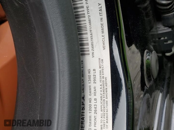2015 Maserati Ghibli z VIN ZAM57XSA7F1148872, wystawiony jako Copart lot #48454165 z przebiegiem 72 232 mil mil oraz Szkoda całkowita • Salvage title. Historia ofert i sprzedaży dostępna na DreamBid. Obrazek 13.