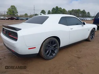 2021 Dodge Challenger GT z VIN 2C3CDZJG5MH674314, wystawiony jako IAAI lot #41593329 z przebiegiem 32 161 mil mil oraz . Historia ofert i sprzedaży dostępna na DreamBid. Obrazek 4.