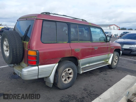 1998 Mitsubishi Montero z VIN JA4MR51RXWJ003468, wystawiony jako IAAI lot #41916695 z przebiegiem 214 694 mil mil oraz . Historia ofert i sprzedaży dostępna na DreamBid. Obrazek 4.
