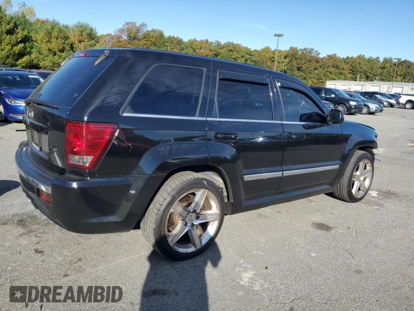 2008 Jeep Grand Cherokee SRT-8 with VIN 1J8HR78368C152318, listed as a Copart auction lot 74203604 with 157,840 mi miles and Salvage Title. Bid and sale history available at carsss.com. Image 3.