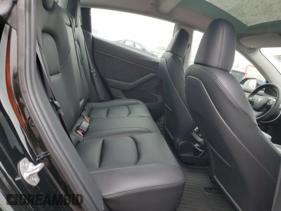 2023 Tesla Model 3 with VIN 5YJ3E1EA9PF687187, listed as a Copart auction lot 61044055 with 7,007 mi miles and Salvage title. Bid and sale history available at DreamBid. Image 10.
