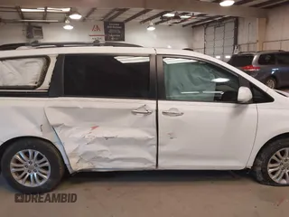 2011 Toyota Sienna XLE AAS with VIN 5TDYK3DC5BS130066, listed as a IAAI auction lot 41294340 with 156,591 mi miles and . Bid and sale history available at DreamBid. Image 13.