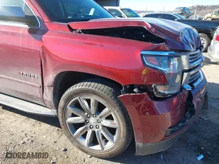 2016 Chevrolet Tahoe LTZ with VIN 1GNSKCKC9GR205745, listed as a IAAI auction lot 41710241 with 94,931 mi miles. Bid and sale history available at carsss.com. Image 6.