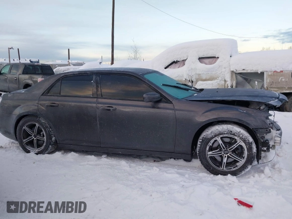 2014 Chrysler 300 with VIN 2C3CCAGG9EH297337, listed as a IAAI auction lot 41268387 with 104,542 mi miles. Bid and sale history available at carsss.com. Image 14.
