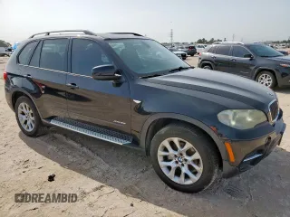 2012 BMW X5 35i with VIN 5UXZV4C54CL754852, listed as a Copart auction lot 62836055 with 108,627 mi miles and Clean title. Bid and sale history available at DreamBid. Image 4.