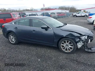 2016 Mazda 6 i Sport with VIN JM1GJ1U55G1472416, listed as a IAAI auction lot 41961622 with 157,315 mi miles and . Bid and sale history available at DreamBid. Image 13.