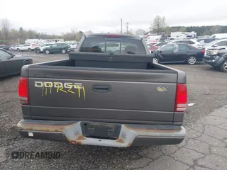 2002 Dodge Dakota with VIN 1B7FL16X62S683972, listed as a IAAI auction lot 41972271 with 158,436 mi miles and . Bid and sale history available at carsss.com. Image 16.