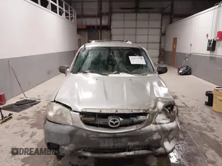 2003 Mazda Tribute DX with VIN 4F2YZ02B73KM43813, listed as a IAAI auction lot 41575708 with 202,214 mi miles and . Bid and sale history available at carsss.com. Image 12.