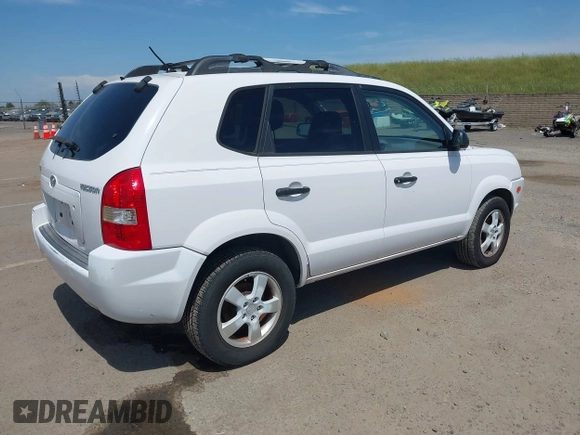 2006 Hyundai Tucson GL with VIN KM8JM12B76U412698, listed as a IAAI auction lot 42055377 with 177,459 mi miles. Bid and sale history available at carsss.com. Image 4.