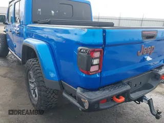 2024 Jeep Gladiator Mojave X z VIN 1C6JJTEG5RL121313, wystawiony jako IAAI lot #41013599 z przebiegiem 2 952 mil mil oraz . Historia ofert i sprzedaży dostępna na DreamBid. Obrazek 22.