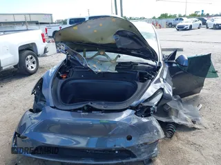 2022 Tesla Model Y Long Range z VIN 7SAYGDEE8NF443194, wystawiony jako IAAI lot #42259205 z przebiegiem 38 540 mil mil oraz . Historia ofert i sprzedaży dostępna na DreamBid. Obrazek 6.