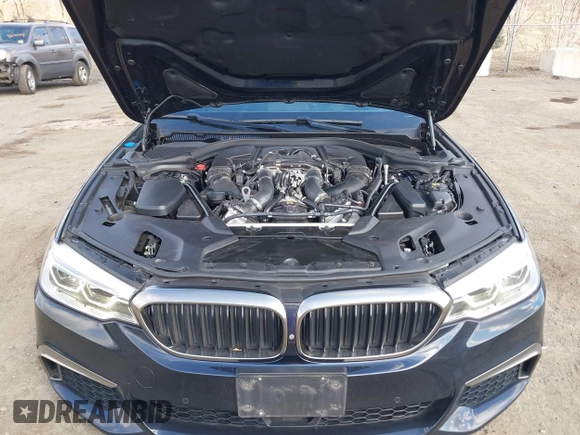 2018 BMW 5 Series M550i xDrive with VIN WBAJB9C52JB035930, listed as a IAAI auction lot 41674415 with 56,294 mi miles and . Bid and sale history available at DreamBid. Image 10.