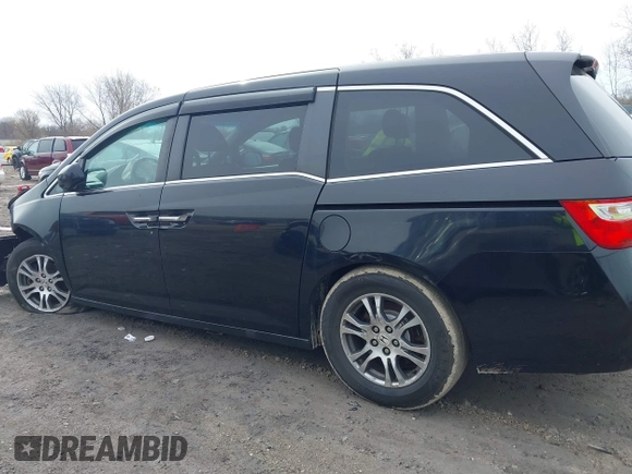2012 Honda Odyssey EX-L with VIN 5FNRL5H63CB070361, listed as a IAAI auction lot 42025024 with 152,258 mi miles and . Bid and sale history available at carsss.com. Image 14.