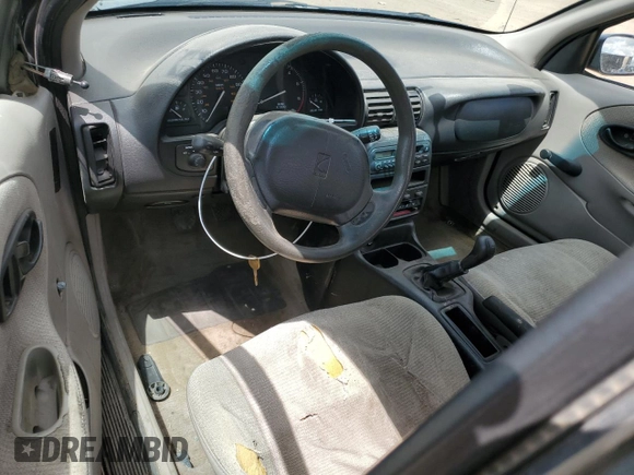 1999 Saturn SL with VIN 1G8ZF5287XZ265634, listed as a Copart auction lot 55973834 with Not Provided miles and Clean Title. Bid and sale history available at carsss.com. Image 8.