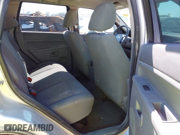 2007 Jeep Grand Cherokee Laredo z VIN 1J8GR48K67C543257, wystawiony jako IAAI lot #41733644 z przebiegiem 201 936 mil mil oraz . Historia ofert i sprzedaży dostępna na DreamBid. Obrazek 8.