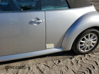 2004 Volkswagen Beetle with VIN 3VWCM21Y34M300701, listed as a Copart auction lot 77567344 with 91,236 mi miles and Salvage Title. Bid and sale history available at DreamBid. Image 12.
