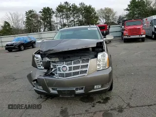 2014 Cadillac Escalade Platinum z VIN 1GYS4DEFXER185821, wystawiony jako Copart lot #78926874 z przebiegiem 142 534 mil mil oraz Szkoda całkowita • Salvage title. Historia ofert i sprzedaży dostępna na DreamBid. Obrazek 12.
