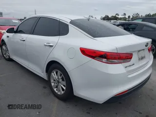 2016 Kia Optima LX with VIN 5XXGT4L32GG047624, listed as a IAAI auction lot 42068219 with 114,316 mi miles. Bid and sale history available at carsss.com. Image 3.