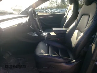 2023 Tesla Model Y Long Range z VIN 7SAYGAEE3PF596826, wystawiony jako Copart lot #50513045 z przebiegiem 30 747 mil mil oraz Szkoda całkowita • Salvage title. Historia ofert i sprzedaży dostępna na DreamBid. Obrazek 7.