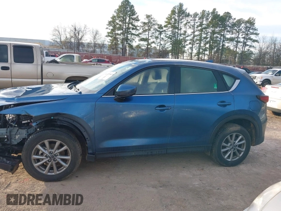 2023 Mazda CX-5 2.5 S with VIN JM3KFBAM3P0284827, listed as a IAAI auction lot 41321041 with 19,780 mi miles. Bid and sale history available at carsss.com. Image 14.