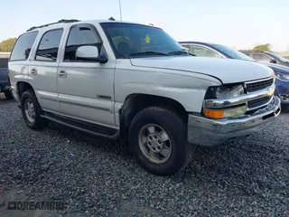 2003 Chevrolet Tahoe LS with VIN 1GNEC13Z83J321559, listed as a IAAI auction lot 41461500 with 180,756 mi miles. Bid and sale history available at carsss.com. Image 1.