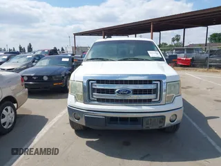 2014 Ford F-150 XL with VIN 1FTFW1CT8EKF55164, listed as a IAAI auction lot 42111483 with 233,166 mi miles. Bid and sale history available at carsss.com. Image 13.