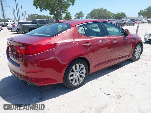 2014 Kia Optima LX with VIN 5XXGM4A75EG329546, listed as a IAAI auction lot 42159226 with 200,963 mi miles. Bid and sale history available at carsss.com. Image 4.