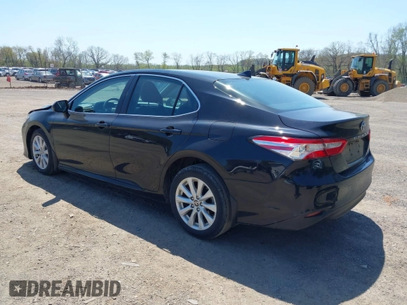 2020 Toyota Camry LE with VIN 4T1C11AK9LU387012, listed as a IAAI auction lot 42103647 with 64,049 mi miles and . Bid and sale history available at carsss.com. Image 3.