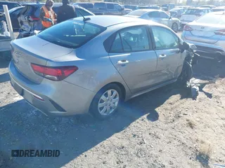 2021 Kia Rio LX with VIN 3KPA24AD1ME398923, listed as a IAAI auction lot 41031202 with 48,919 mi miles. Bid and sale history available at carsss.com. Image 4.