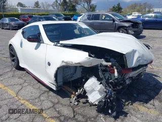 2015 Nissan 370Z z VIN JN1AZ4EH4FM442123, wystawiony jako IAAI lot #41955558 z przebiegiem 79 695 mil mil oraz . Historia ofert i sprzedaży dostępna na DreamBid. Obrazek 1.