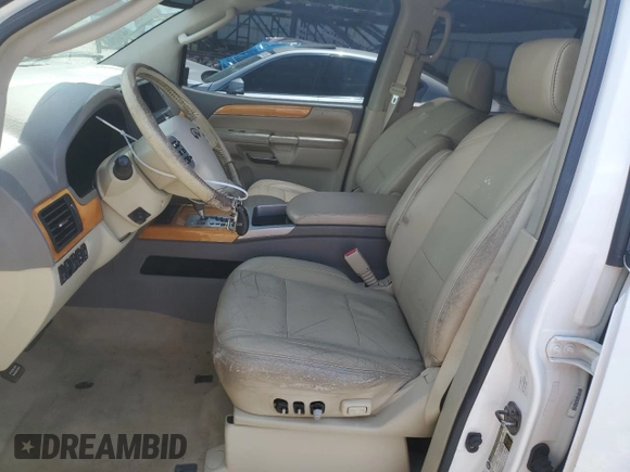 2010 Infiniti QX56 with VIN 5N3ZA0NF3AN904787, listed as a Copart auction lot 55149195 with 227,730 mi miles and Salvage title. Bid and sale history available at DreamBid. Image 7.