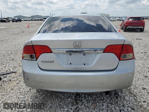 2009 Honda Civic LX z VIN 2HGFA16569H303861, wystawiony jako Copart lot #53148385 z przebiegiem 164 179 mil mil oraz Szkoda całkowita • Salvage title. Historia ofert i sprzedaży dostępna na DreamBid. Obrazek 6.
