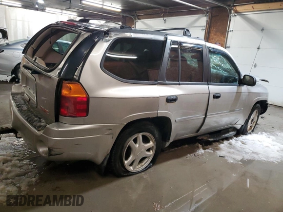 2007 GMC Envoy SLE with VIN 1GKDT13S572301992, listed as a Copart auction lot 87404174 with 131,741 mi miles and Salvage Title. Bid and sale history available at carsss.com. Image 3.
