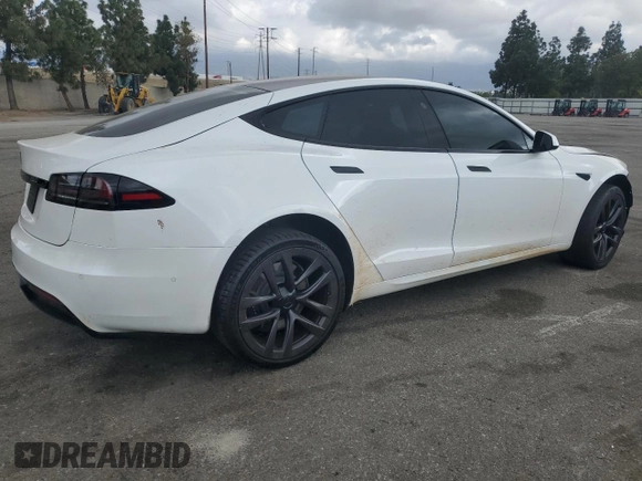2022 Tesla Model S with VIN 5YJSA1E53NF492855, listed as a Copart auction lot 54545185 with 62,856 mi miles and Salvage title. Bid and sale history available at DreamBid. Image 3.