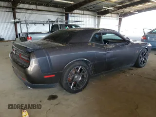 2016 Dodge Challenger R/T Scat Pack z VIN 2C3CDZFJXGH240494, wystawiony jako Copart lot #57259225 z przebiegiem 54 651 mil mil oraz Tytuł czysty. Historia ofert i sprzedaży dostępna na DreamBid. Obrazek 3.