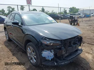2022 Mazda CX-30 S Premium with VIN 3MVDMBDL9NM443336, listed as a IAAI auction lot 42468766 with 62,550 mi miles and . Bid and sale history available at DreamBid. Image 1.