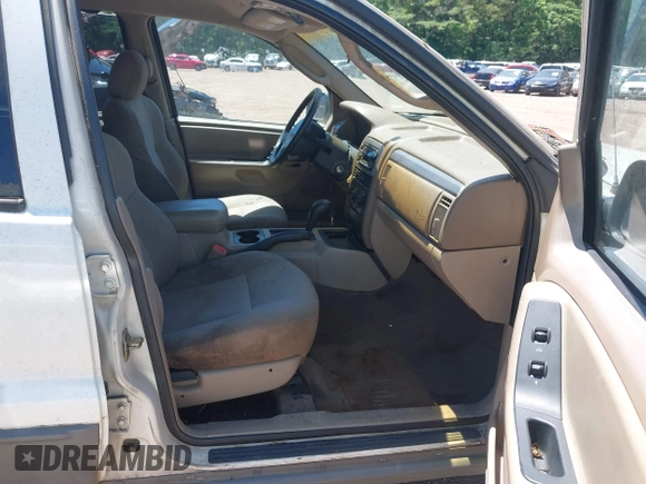 2002 Jeep Grand Cherokee Laredo with VIN 1J4GX48S32C134911, listed as a IAAI auction lot 42323138 with 156,852 mi miles and . Bid and sale history available at DreamBid. Image 5.
