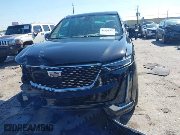2020 Cadillac XT6 FWD Premium Luxury z VIN 1GYKPERS0LZ232338, wystawiony jako IAAI lot #41845562 z przebiegiem 86 839 mil mil oraz . Historia ofert i sprzedaży dostępna na DreamBid. Obrazek 12.