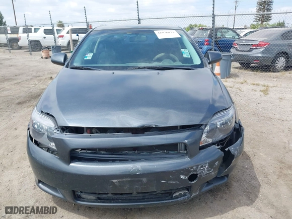 2006 Scion tC with VIN JTKDE177260081483, listed as a IAAI auction lot 42076072 with 156,556 mi miles. Bid and sale history available at carsss.com. Image 13.