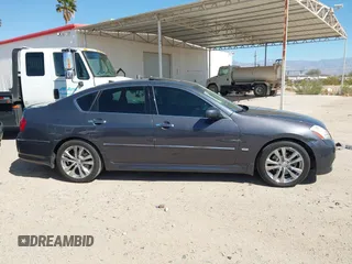 2010 Infiniti M with VIN JN1CY0AP0AM911640, listed as a IAAI auction lot 41549869 with 153,445 mi miles. Bid and sale history available at carsss.com. Image 13.