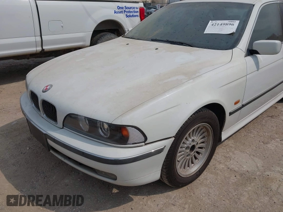 1997 BMW 5 Series 540i z VIN WBADE6327VBW50066, wystawiony jako IAAI lot #42149896 z przebiegiem 191 339 mil mil oraz . Historia ofert i sprzedaży dostępna na DreamBid. Obrazek 6.