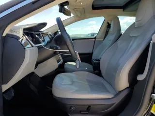 2014 Tesla Model S 60 with VIN 5YJSA1H18EFP34998, listed as a Copart auction lot 55416135 with 229,107 mi miles and Salvage title. Bid and sale history available at DreamBid. Image 7.