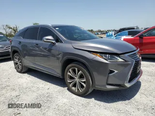 2017 Lexus RX 350 z VIN 2T2ZZMCA3HC083767, wystawiony jako Copart lot #57218435 z przebiegiem 107 719 mil mil oraz Szkoda całkowita • Salvage title. Historia ofert i sprzedaży dostępna na DreamBid. Obrazek 4.