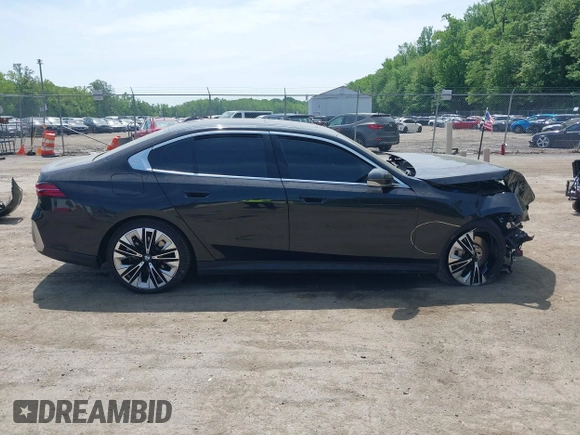 2024 BMW 5 Series 530i xDrive with VIN WBA53FJ01RCP69792, listed as a IAAI auction lot 42240736 with Not provided miles and . Bid and sale history available at DreamBid. Image 13.