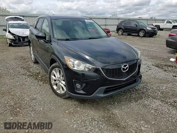 2014 Mazda CX-5 Grand Touring with VIN JM3KE4DY3E0304908, listed as a Copart auction lot 53873655 with 144,382 mi miles and Salvage Title. Bid and sale history available at DreamBid. Image 15.