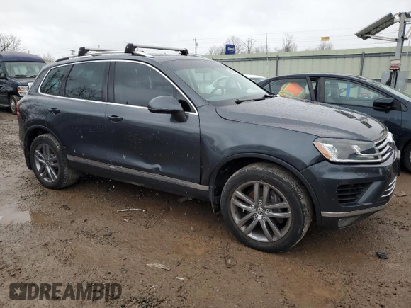 2015 Volkswagen Touareg Sport with VIN WVGEF9BP0FD003335, listed as a Copart auction lot 85151024 with 159,336 mi miles and Clean title. Bid and sale history available at DreamBid. Image 4.